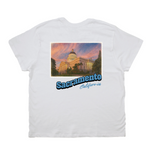 White t-shirt with a graphic of the Sacramento State Capitol building and 'Sacramento, California' text on a white background.