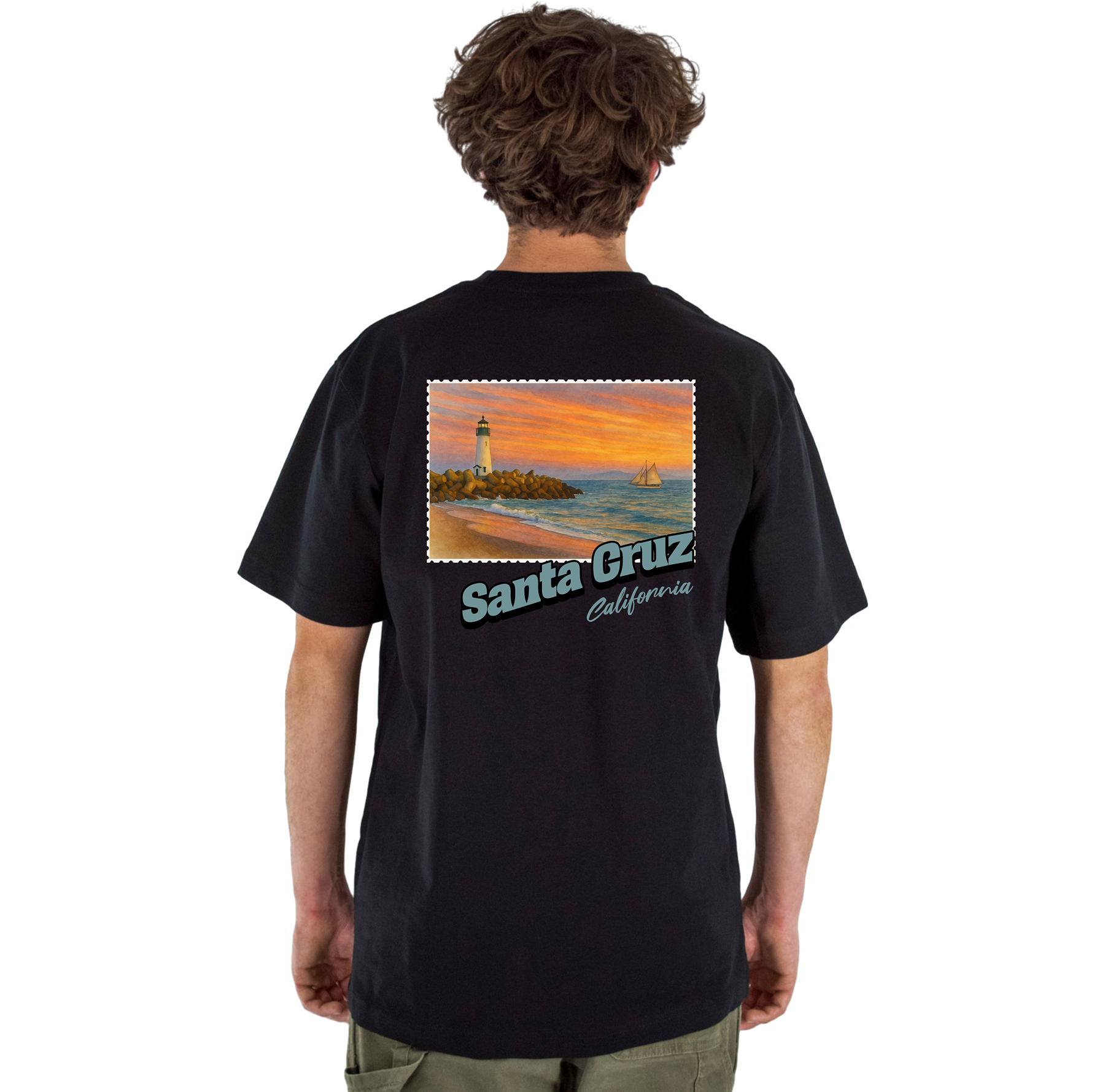 Person wearing a black t-shirt with a beach scene and 'Santa Cruz California' text on the back.