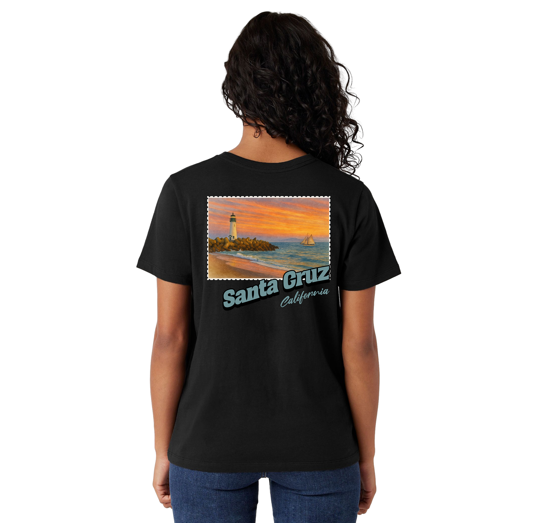 Person wearing a black t-shirt with a scenic design and 'Santa Cruz California' text on the back.
