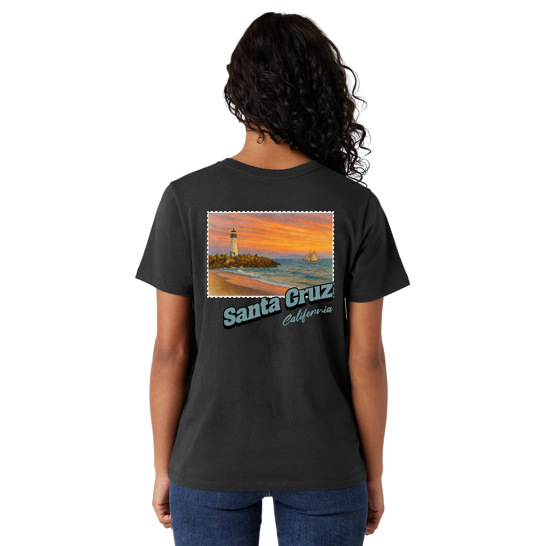 Person wearing a black t-shirt with a scenic design and 'Santa Cruz California' text on the back.