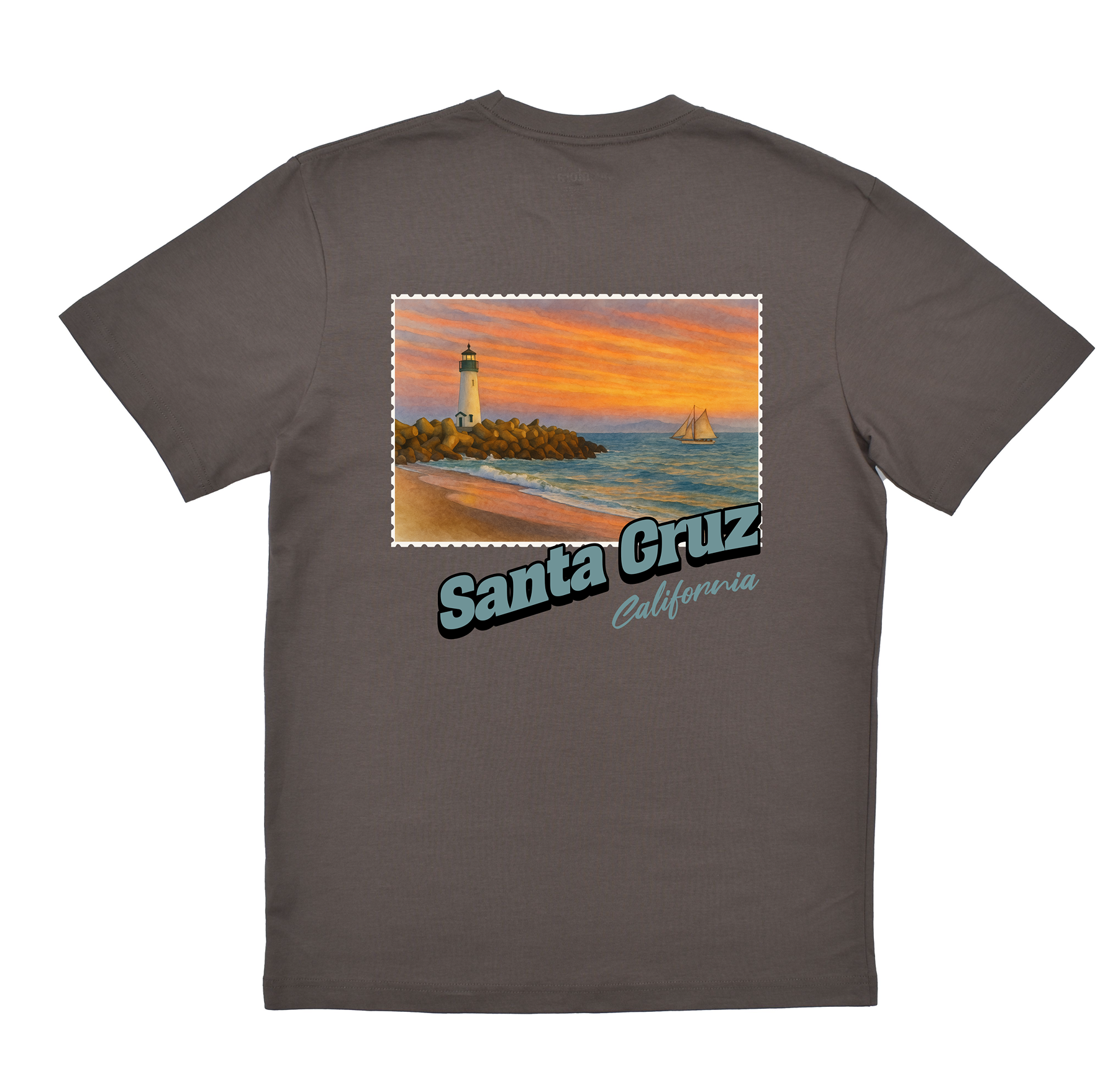 Gray t-shirt with a scenic print of a lighthouse and sunset over water on a white background