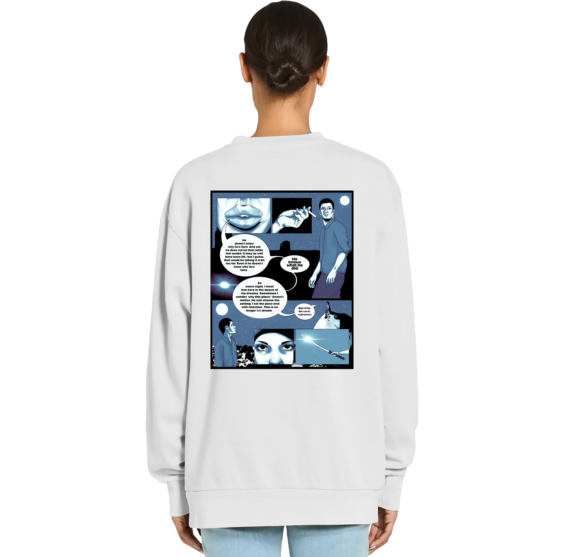 Person wearing a white sweatshirt with a comic-style design on the back against a white background