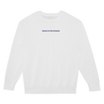 White sweatshirt with 'Desert of His Dreams' text on a white background