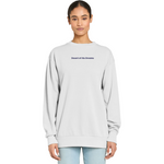 Person wearing a light gray sweatshirt with text on a white background