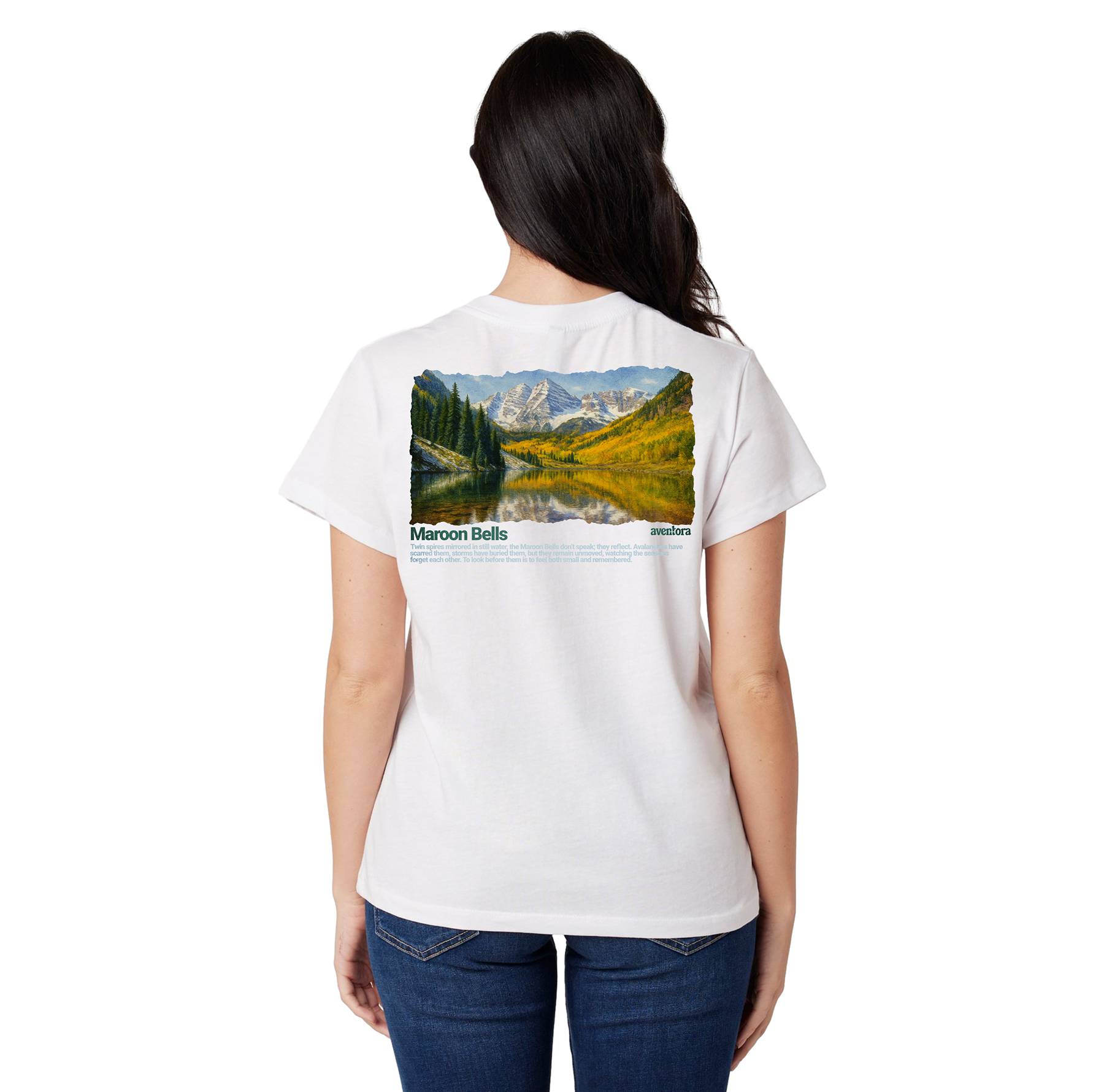 Person wearing a white t-shirt with a scenic print on the back