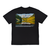 Black t-shirt with a scenic print of mountains and lake on a white background. Maroon Bells