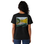 Person wearing a black t-shirt with a scenic design and 'Maroon Bells Colorado' text on the back.