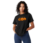 Person wearing a black t-shirt with Halloween-themed design on a white background