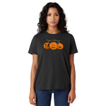 Woman wearing a black t-shirt with Halloween-themed design on a white background