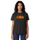 Woman wearing a black t-shirt with Halloween-themed design on a white background