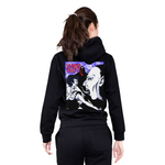 Person wearing a black hoodie with a graphic design on the back, standing against a white background