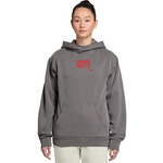 Person wearing a gray hoodie with red text on a white background
