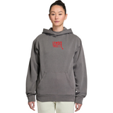 Person wearing a gray hoodie with red text on a white background