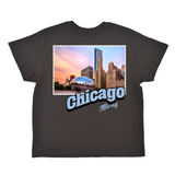 Black t-shirt with a graphic of Chicago skyline and 'Chicago Illinois' text on a white background