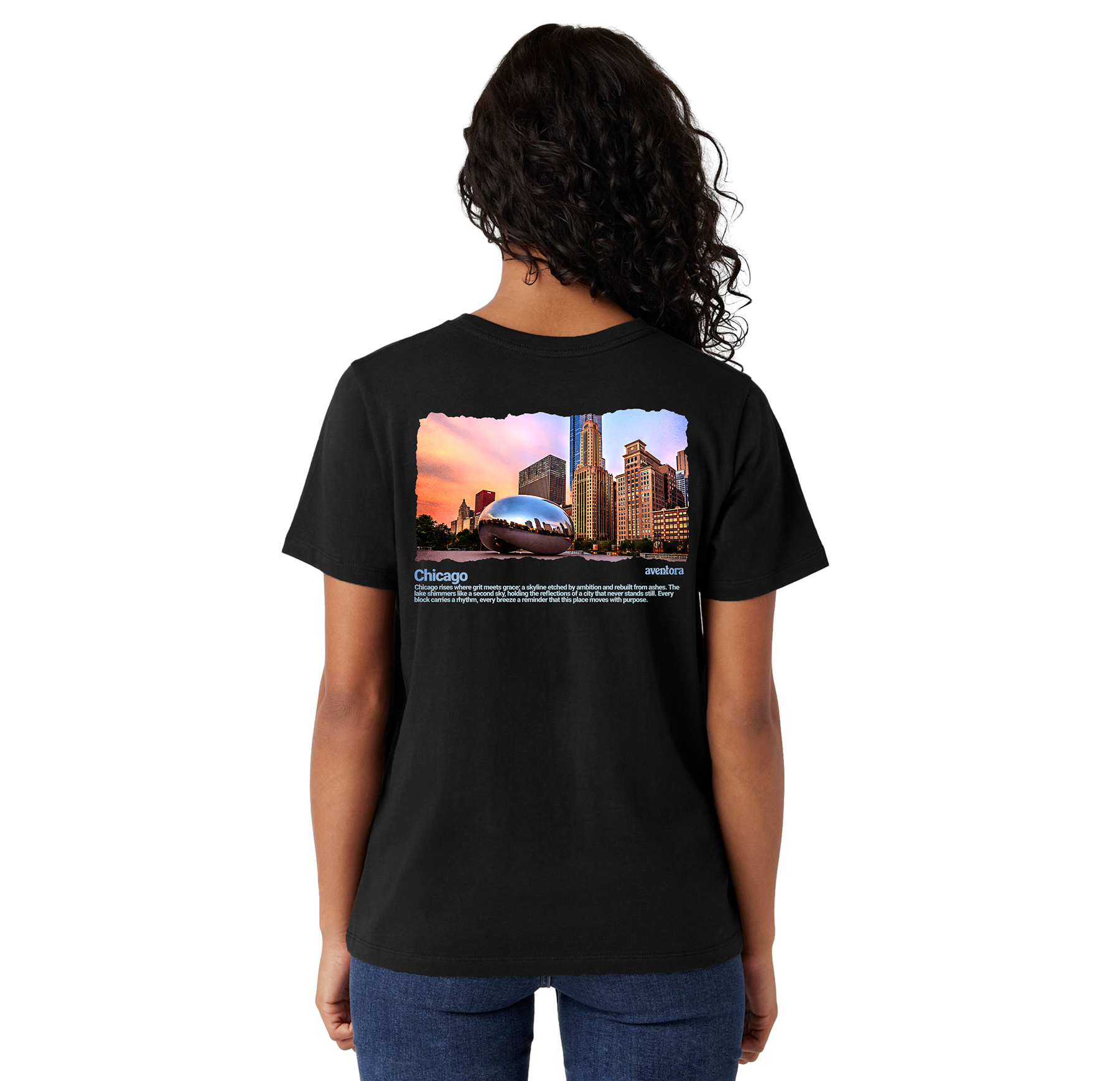 Person wearing a black t-shirt with a cityscape design on the back
