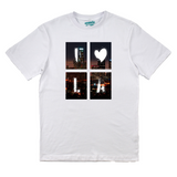 White t-shirt with a graphic design of a heart and cityscape on a white background