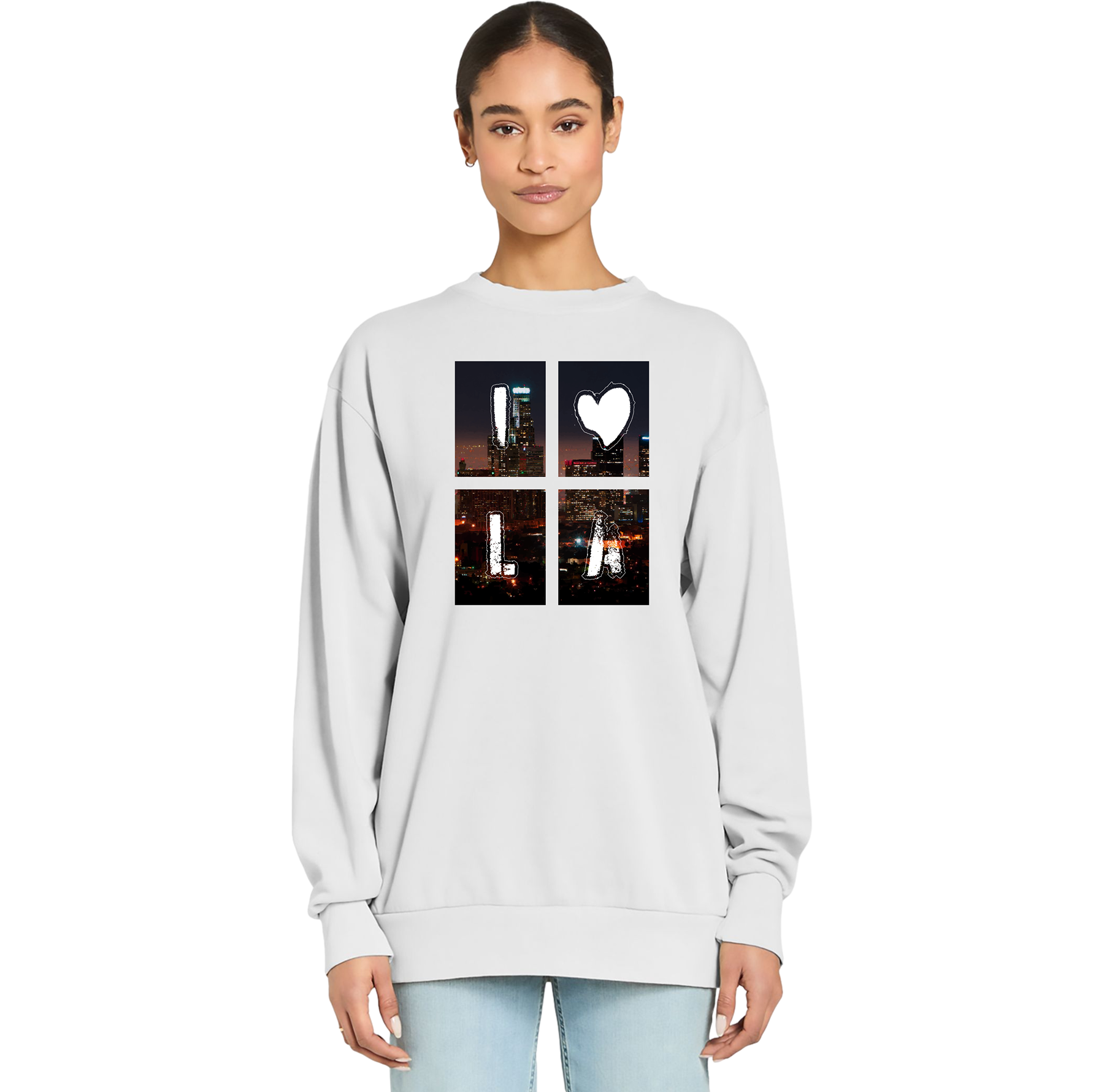 Person wearing a light gray sweatshirt with a design on the chest