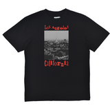 Black t-shirt with 'Los Angeles California' text and cityscape graphic on a white background