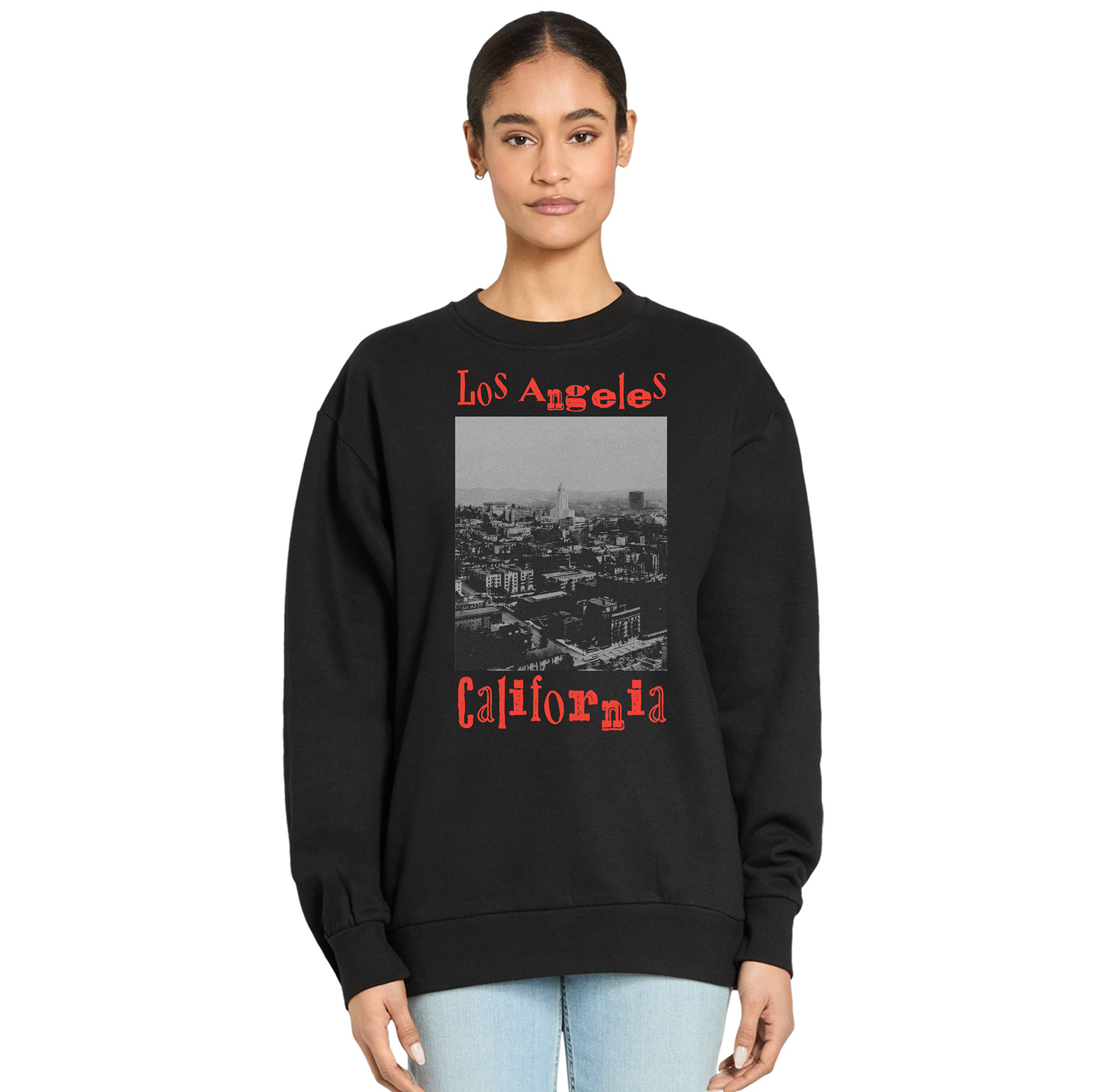 Black sweatshirt with 'Los Angeles California' text and cityscape graphic worn by a person on a white background