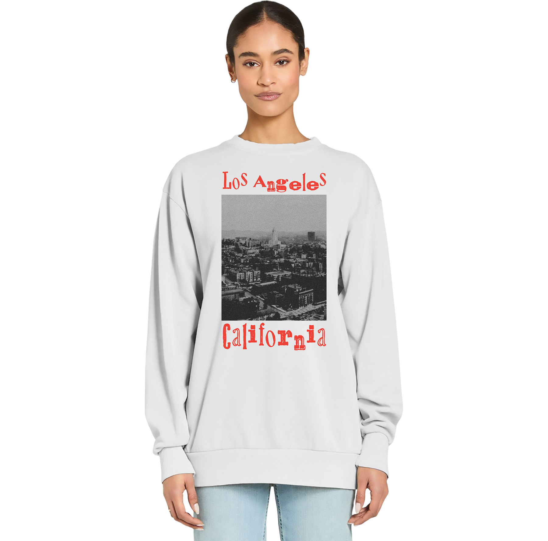 Person wearing a light gray sweatshirt with 'Los Angeles California' text and graphic on a white background