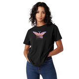 Person wearing a black t-shirt with a butterfly design on a white background