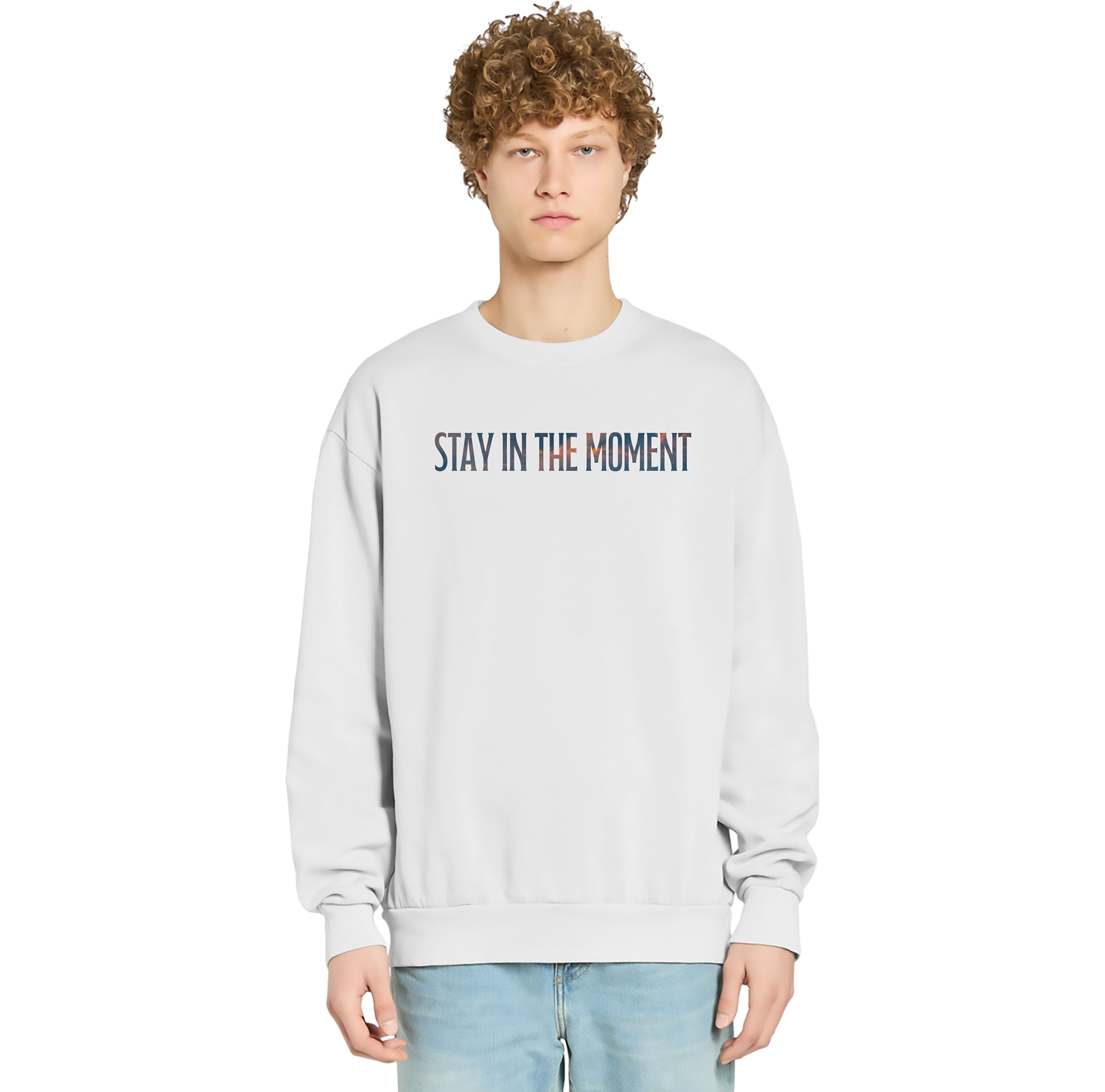 Person wearing a light gray sweatshirt with 'STAY IN THE MOMENT' text on a white background