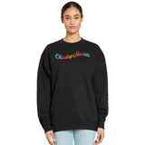 Black sweatshirt with 'Chasing Sunsets' text in colorful letters worn by a person on a white background