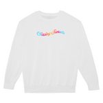 White sweatshirt with 'Chasing Sunsets' text in colorful letters on a white background