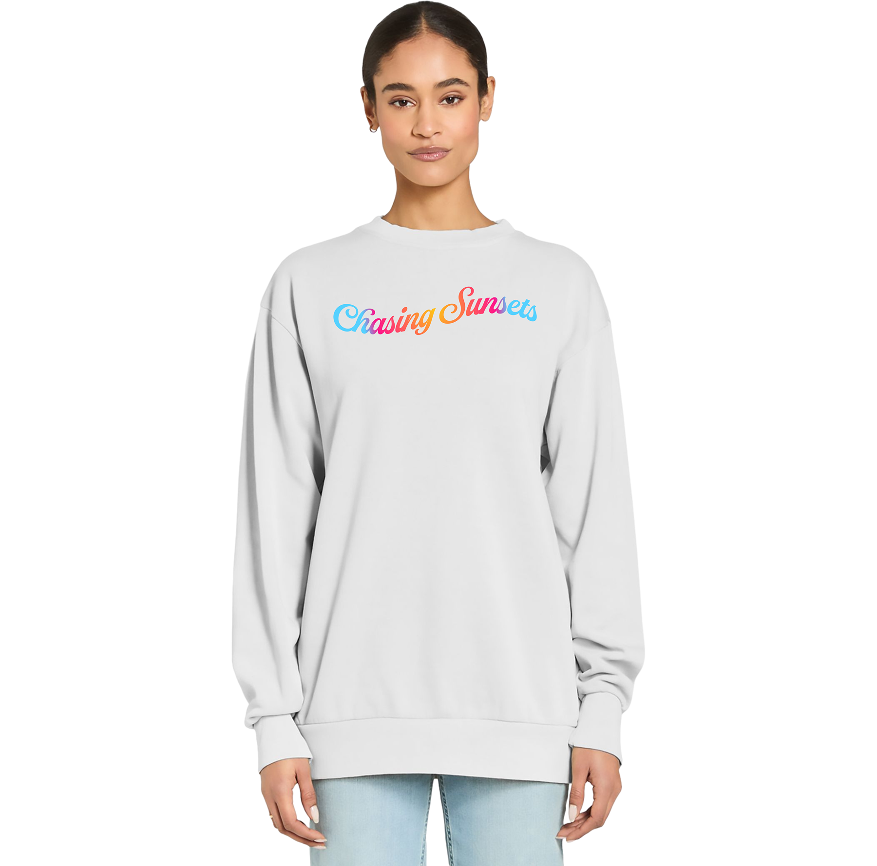 Person wearing a light gray sweatshirt with 'Chasing Sunsets' text in colorful letters on a white background