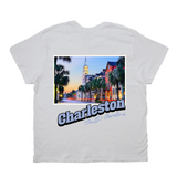 White t-shirt with a scenic print of Charleston, South Carolina on a white background