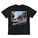 Black t-shirt with a graphic of Charleston, South Carolina and a scenic street view.
