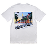 White t-shirt with a scenic print of Charleston, South Carolina on the back.