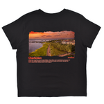 Black t-shirt with a scenic print of Charleston and text on a white background