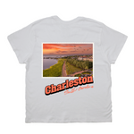 White t-shirt with a scenic print and 'Charleston South Carolina' text on a white background