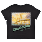 Black t-shirt with a bridge graphic and 'Charleston, South Carolina' text on a white background