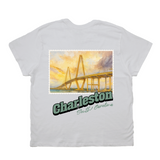 White t-shirt with a bridge graphic and 'Charleston South Carolina' text on a white background