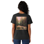 Person wearing a black t-shirt with a forest graphic and 'Santa Cruz, CA' text on the back.