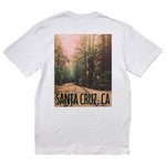 White t-shirt with a scenic print of a forest road and 'Santa Cruz, CA' text on a white background