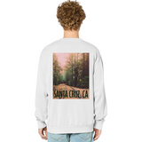 Person wearing a white sweatshirt with a forest graphic and 'Santa Cruz, CA' text on the back.