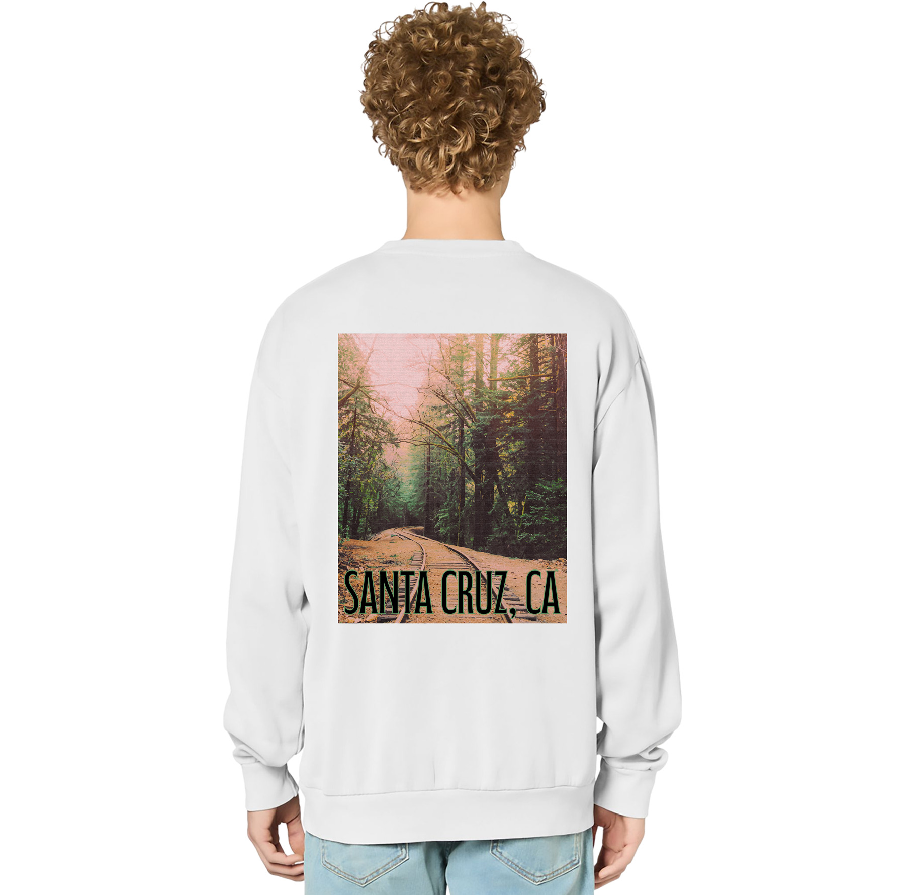 Person wearing a white sweatshirt with a forest graphic and 'Santa Cruz, CA' text on the back.