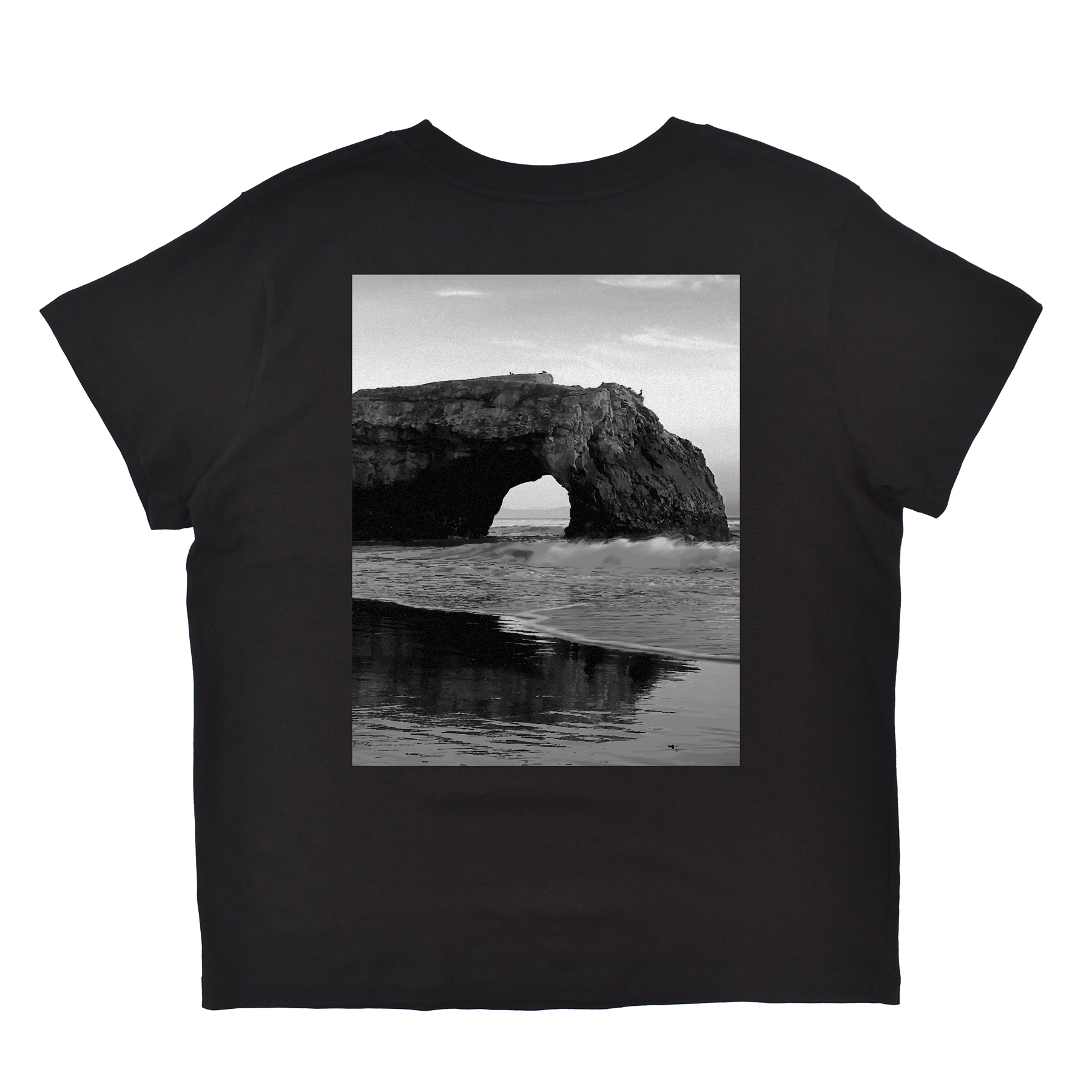 Black t-shirt with a graphic of a coastal arch on a white background