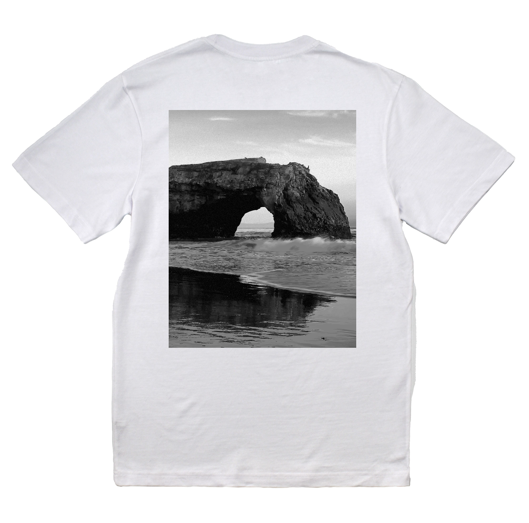 White t-shirt with a black and white graphic of a coastal arch on the back