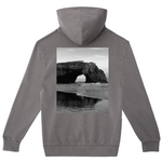 Gray hoodie with a black and white photograph of a natural arch on the back, displayed on a white background.