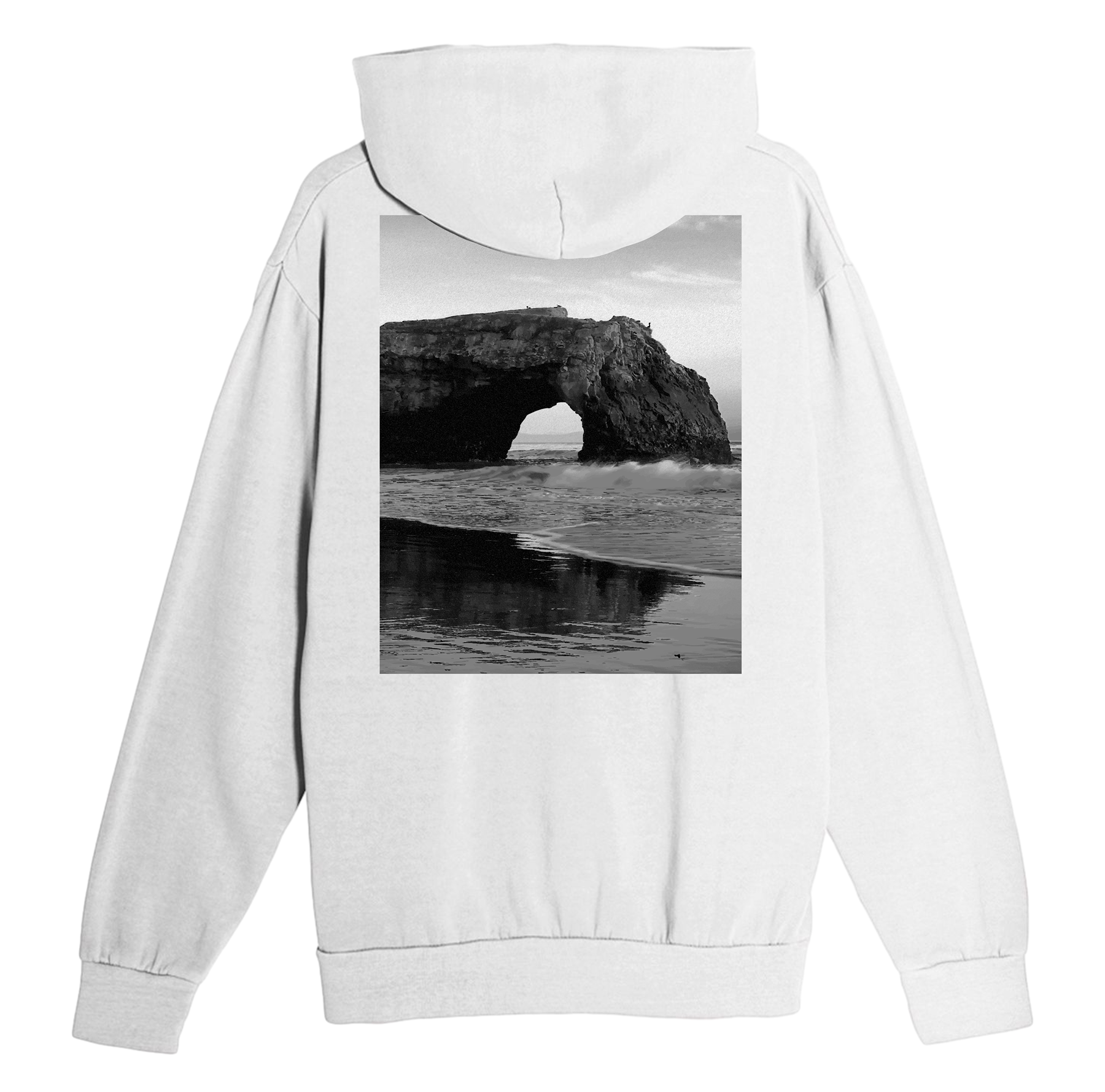 White hoodie with a black and white photo of a natural arch on the back