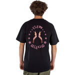 Person wearing a black t-shirt with 'Club Slugs' design on the back
