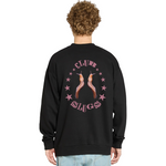 Person wearing a black sweatshirt with 'Club Slugs' design on the back, standing against a white background.