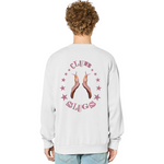 Person wearing a light gray sweatshirt with 'Club Slugs' design on the back, standing against a white background.