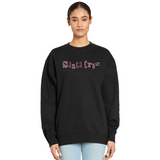 Person wearing a black sweatshirt with 'Santa Cruz' text on a white background